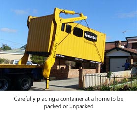 Picture of container being placed on a driveway