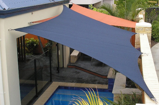 Shade sails over pool