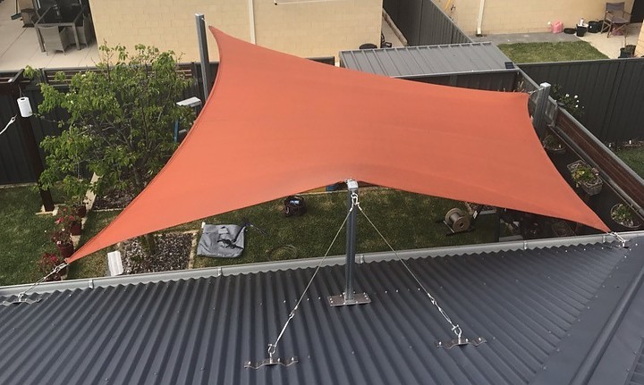 Photograph of Rainbow Shade Z16 fabric
Colour - Rust Gold
5 point sail with a Colorbond high roof mast to create a nice high line
