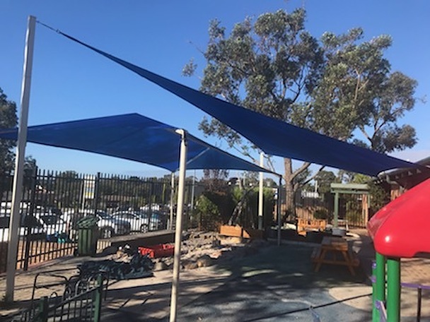 Photograph of We were called back to this daycare centre to do even more work because they were so happy with our previous work there.
1 x shade sail
1 x hip & ridge canopy
Rainbowshade Z16 Royal Blue
